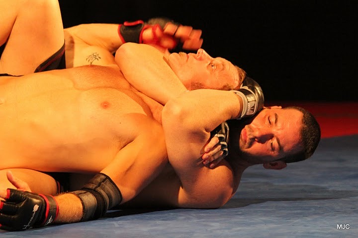 Scott Tannenbaum locking in a submission during an MMA fight